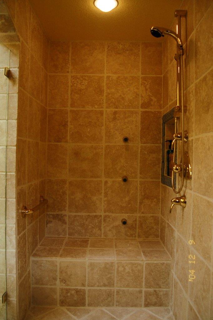 Custom shower plumbing, shower doors, tile, shower pans, electrical.